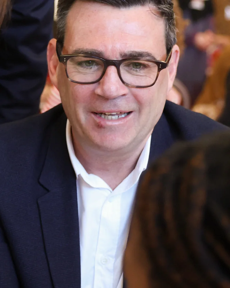 After: Andy Burnham, dark hair and rectangular glasses.
